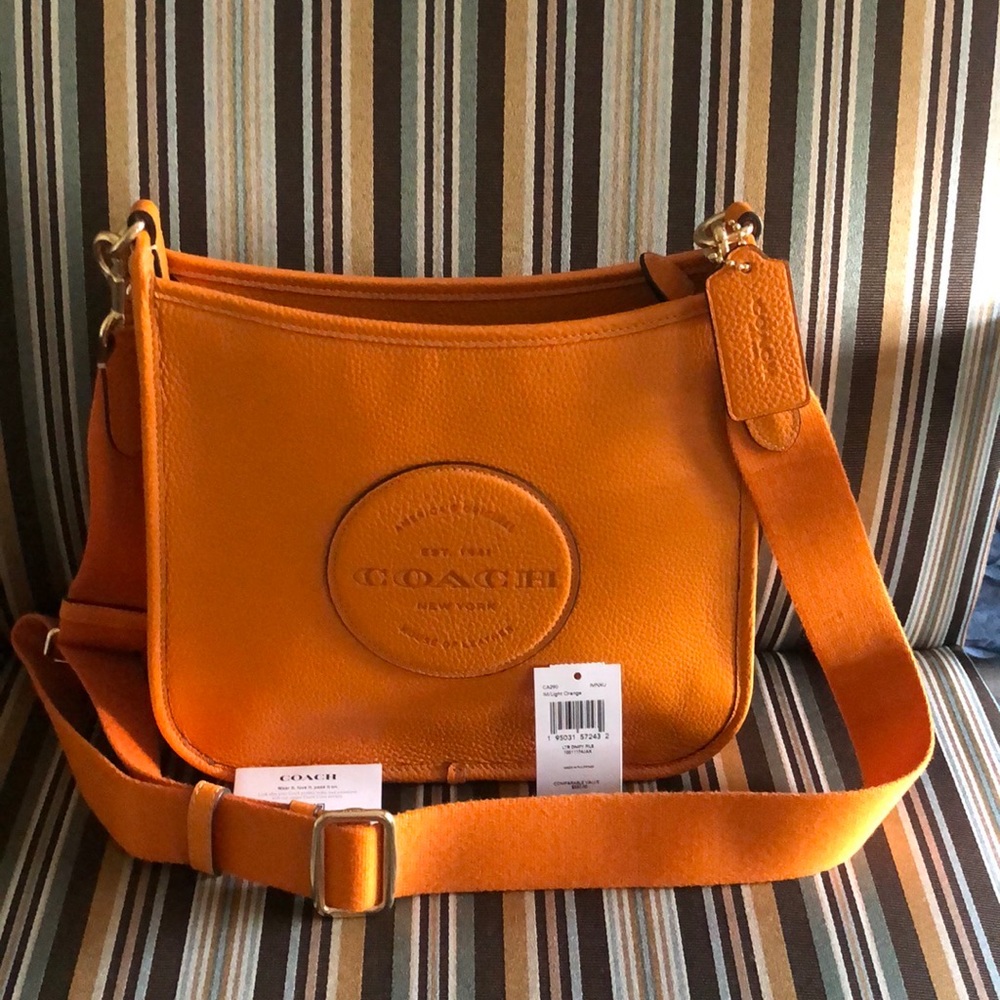 Like new! Coach Dempsey file bag in light orange
